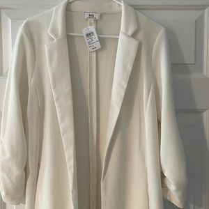 Off white duster. New with tags. Never worn.